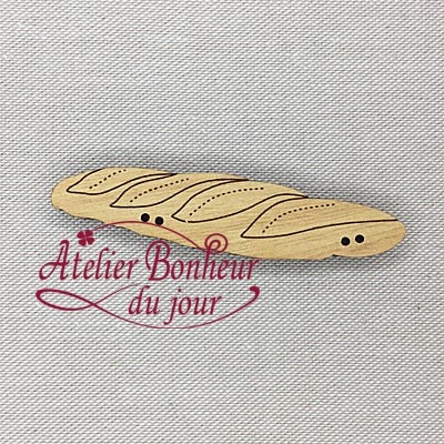 Bouton décoratif en bois "baguette de pain"